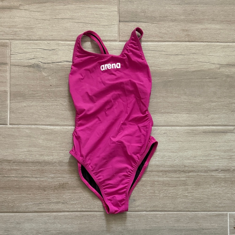 arena pink tech suit